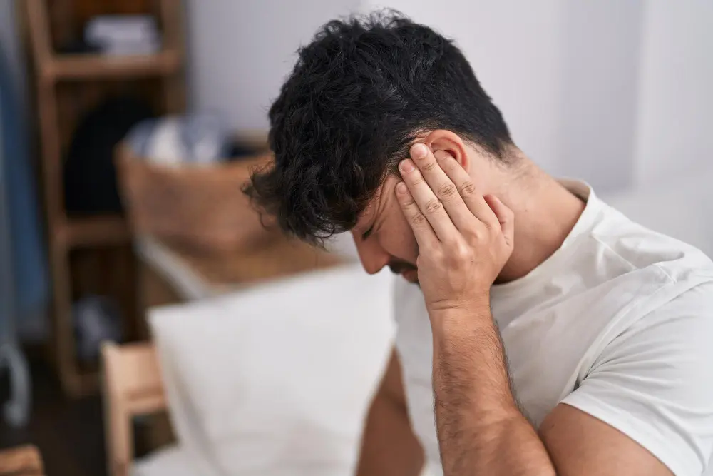 Chiropractor consulting patient recovering from concussion