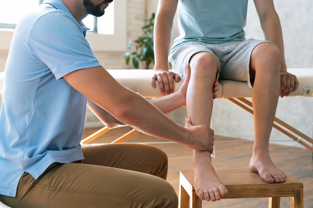 Patient receiving combined chiropractic adjustment and laser therapy for faster injury recovery